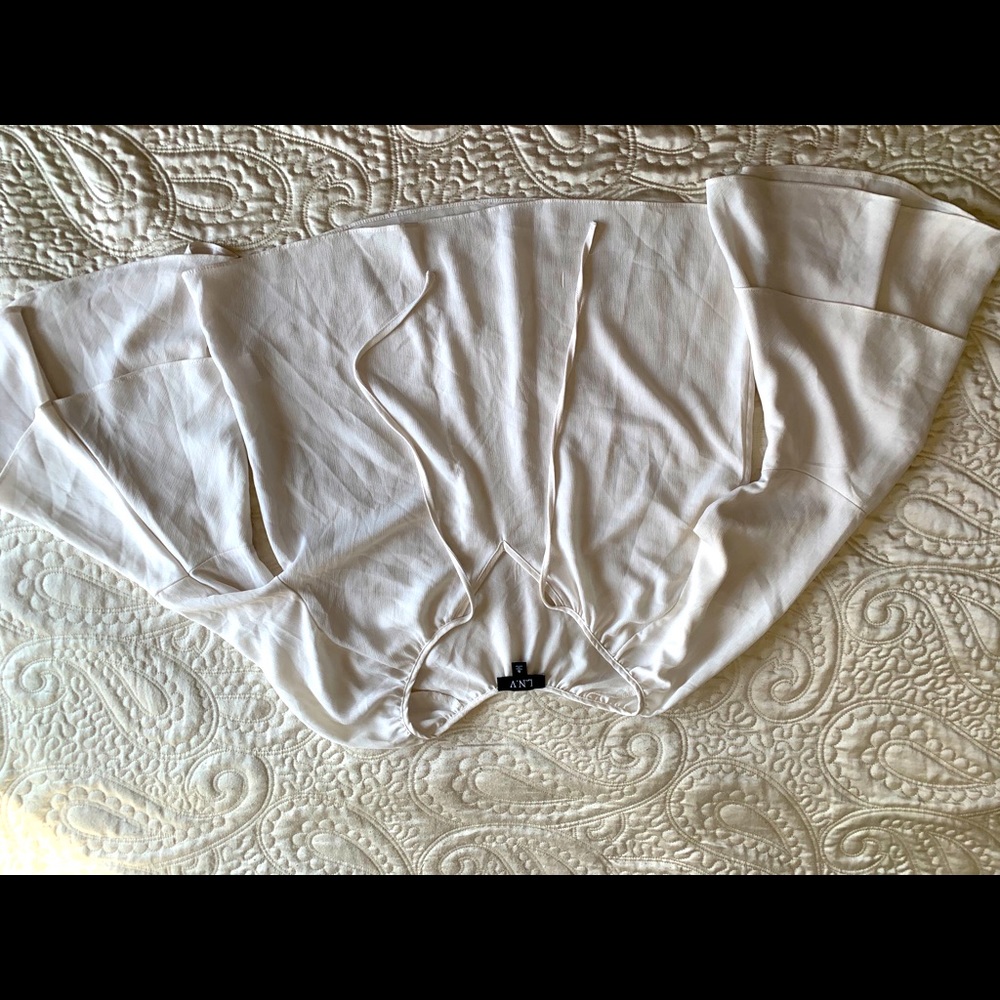 White bell sleeved blouse